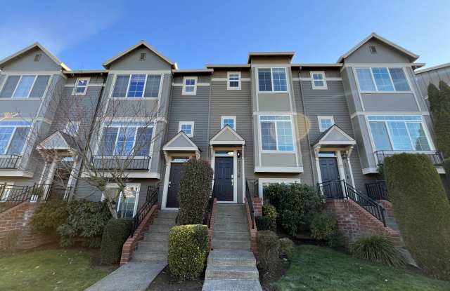Bright 3-Level Townhome with Open-Concept Living, Built-In Fireplace  Included Wi-Fi
