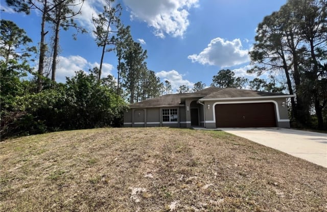 1010 Candlelight Drive - 1010 Candlelight Drive, Lehigh Acres, FL 33974