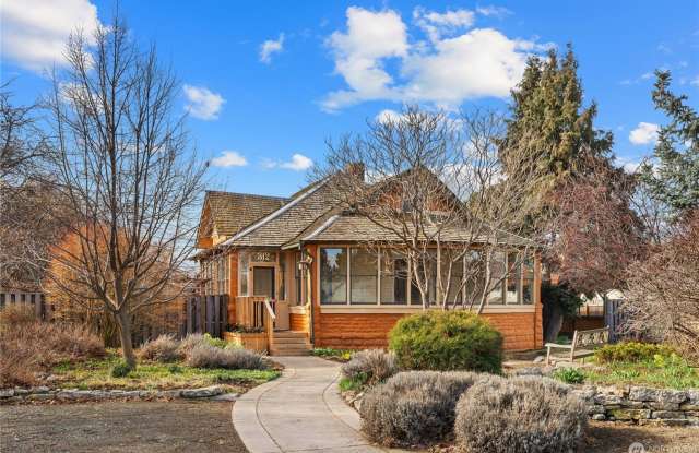 One-of-a-Kind Spacious Home with Beautiful Landscaped Grounds