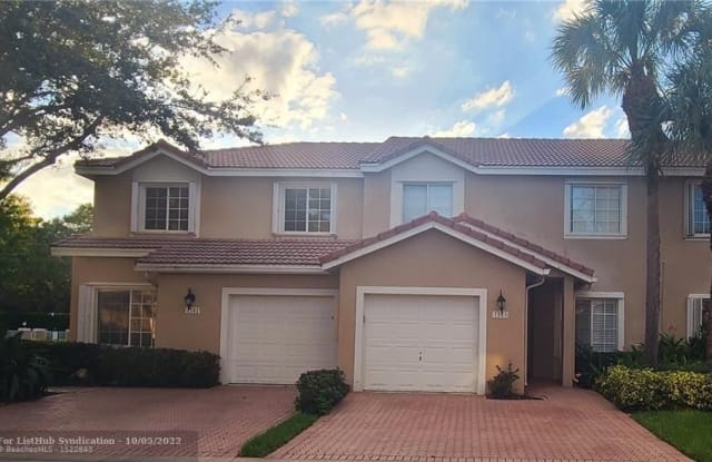 7303 NW 61ST TER - 7303 Northwest 61st Terrace, Parkland, FL 33067