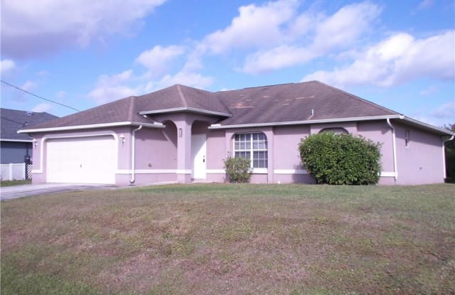 845 Wolverine ST E - 845 Wolverine Street, Lehigh Acres, FL 33974