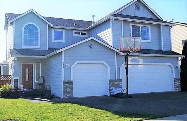 Welcoming Home with High Ceilings and Spacious Floor Plan