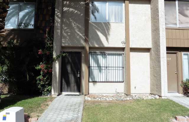 Photo of Community Pool and Spa. 2 Story, 2 Bedrooms, All Bedroom upstairs. New remodel kitchen with white cabinets, new sink and faucet, granite countertops, new bathroom granite countertops, new sinks and new faucets. Luxury Vinyl Plank flooring.