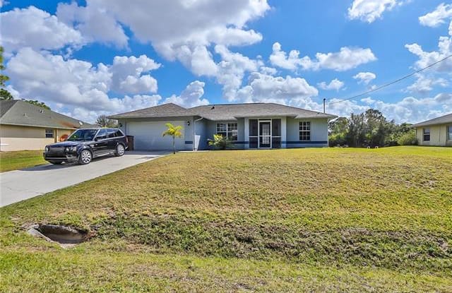 2141 Fairway DR - 2141 Fairway Drive, Lehigh Acres, FL 33973