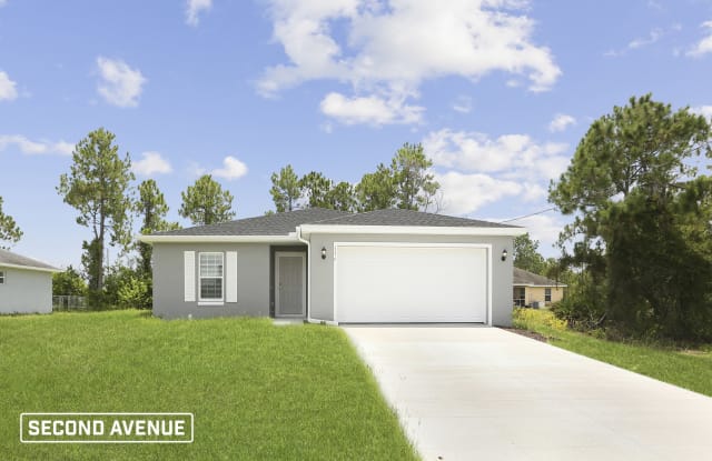 736 Barcia St E - 736 Barcia Street East, Lehigh Acres, FL 33974