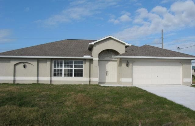 710 Castlestone Ave S - 710 Castlestone Avenue South, Lehigh Acres, FL 33974