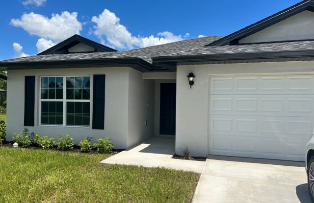 455 Mercedes CT - 455 Mercedes Court, Lehigh Acres, FL 33972