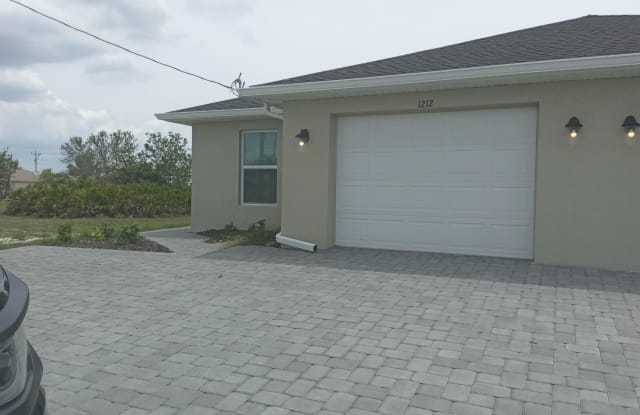 1214 NW 16th Terr - 1214 Northwest 16th Terrace, Cape Coral, FL 33993