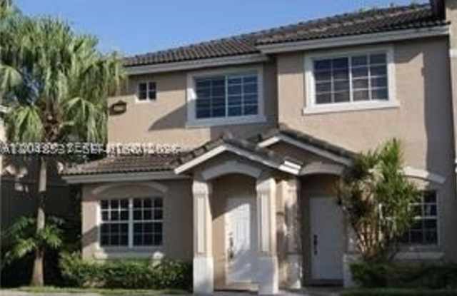 5779 NW 116 AV