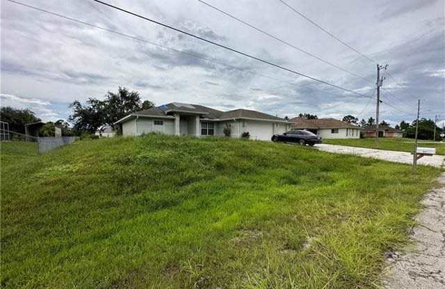 821 Hibiscus AVE - 821 Hibiscus Avenue, Lehigh Acres, FL 33972