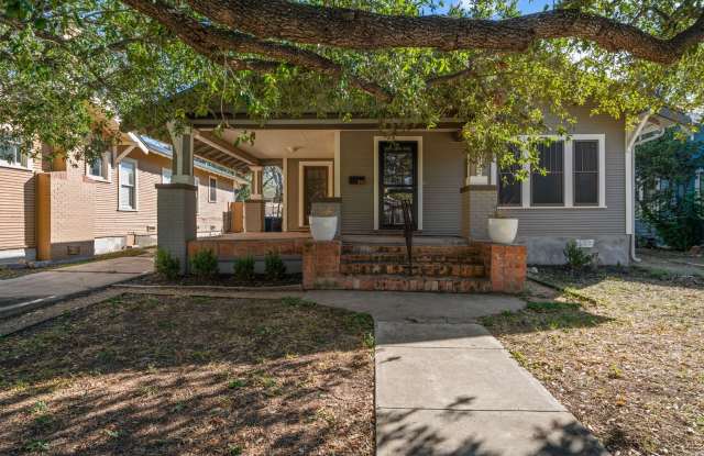 Photo of Love where you live in this beautifully updated 2-bedroom, 1-bath home featuring stunning hardwood floors and elegant finishes throughout
