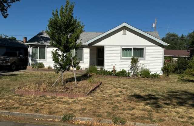 SINGLE LEVEL HOME WITH SPACIOUS FENCED IN YARD