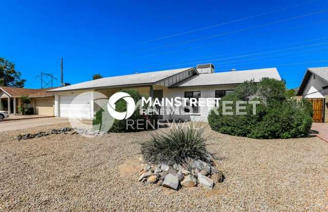 12022 South Mandan Street