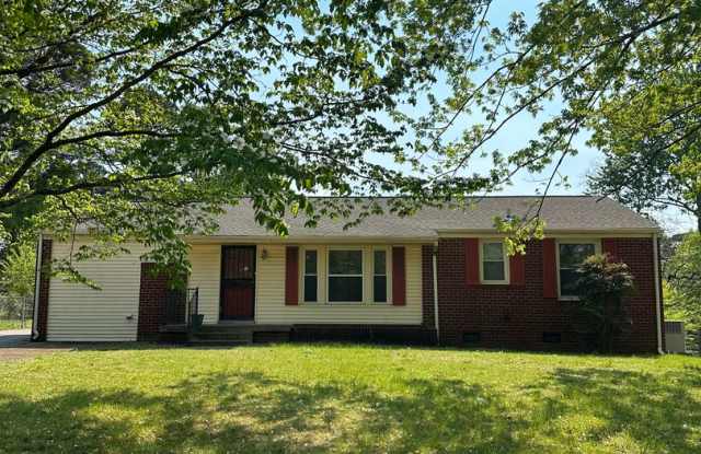 A quaint three bedroom one bath single family house in Lakewood Manor Subdivision