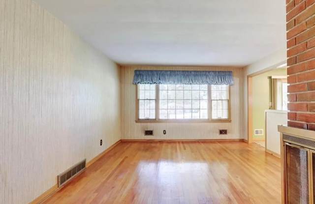 Large 3 bedroom home with 4th non-conforming room and unfinished basement!