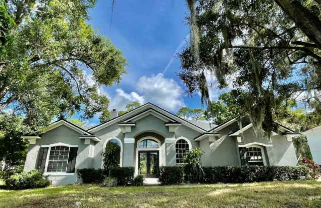 Photo of Beautifully Renovated 4/3 Home ~ East Orlando ~ Fenced Yard ~ No HOA!