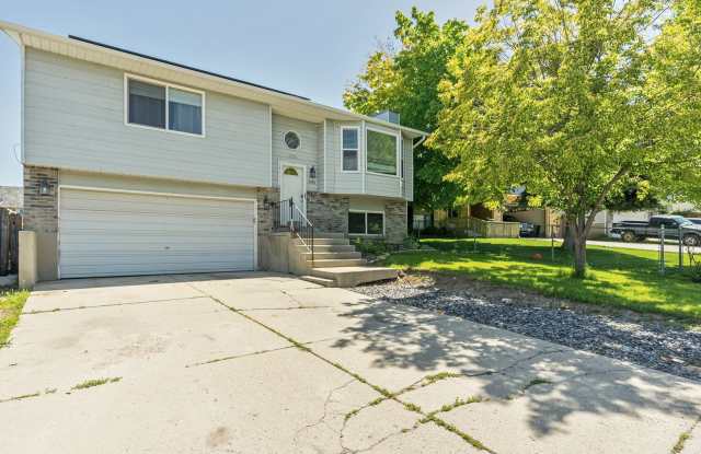 Photo of Spacious 4-Bedroom Home in West Jordan with Fenced Yard  2-Car Garage