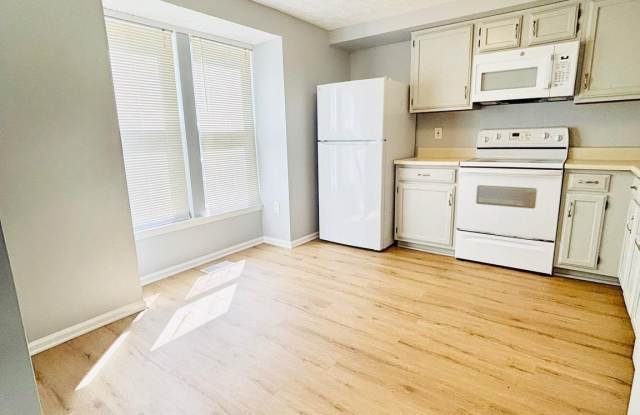 1410 POINT O WOODS Court