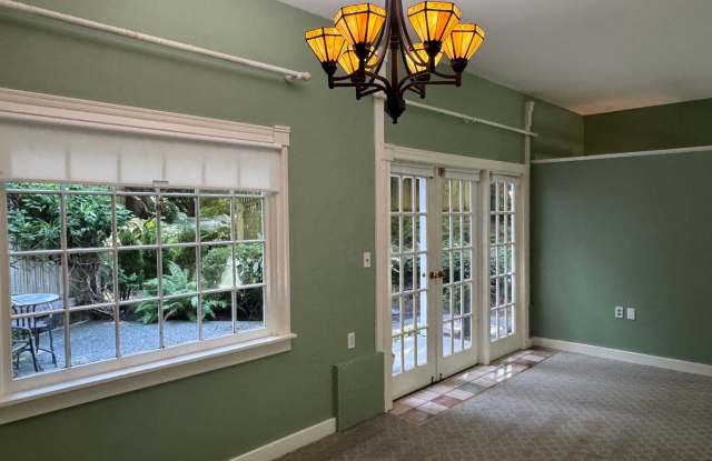 Charming oversized one bedroom cottage nestled quietly among a beautiful Bainbridge oasis