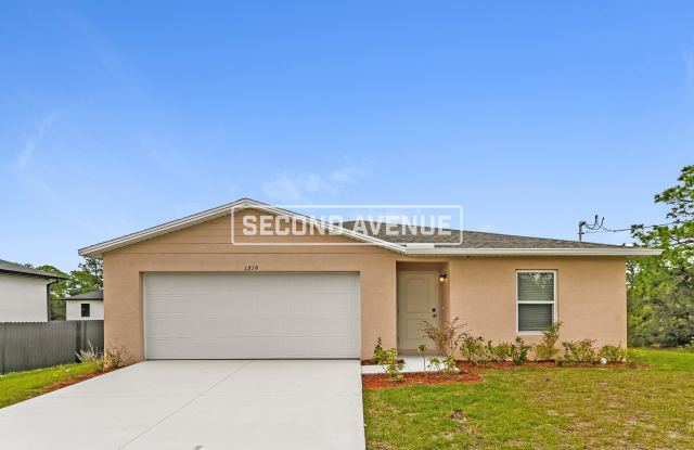 1219 Chrysler St - 1219 Chrysler Street, Lehigh Acres, FL 33974