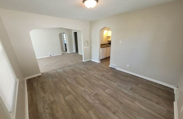 Two Bedroom with rear sun room bonus room, and enclosed porch just South of downtown!