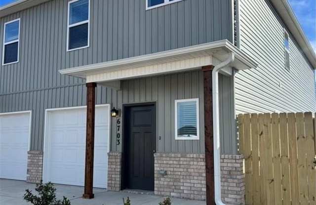 6703  SW Dignity  AVE