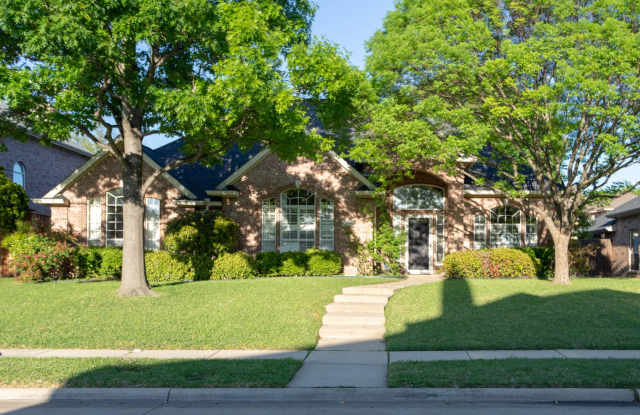 This home comes with solar panels installed and ready to use. This home features an open floor plan and great living spaces - 7304 Valley Bend Way, Plano, TX 75024