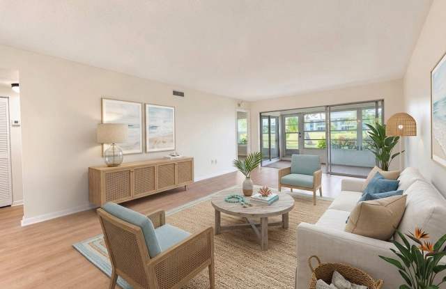 AVAILABLE NOW! Beautifully Renovated First-Floor Condo with Peaceful Screened Lanai