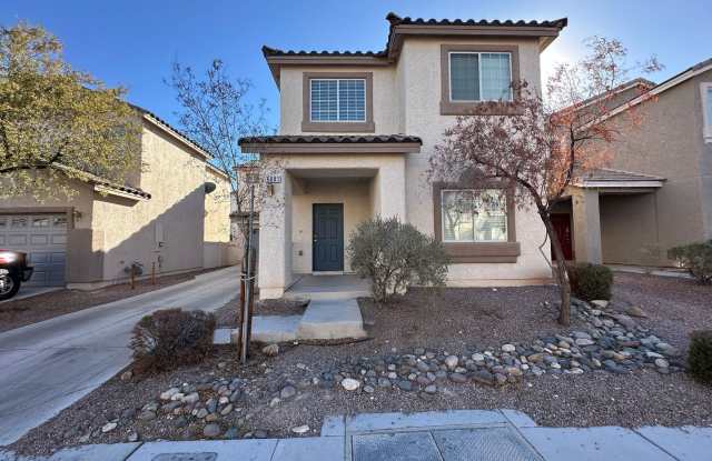 Beautiful two story house with an extra long driveway  a bedroom/bathroom downstairs! On the second floor there are three bedrooms for a total of four! Master bedroom has its own balcony! Backyard is spacious with covered patio!