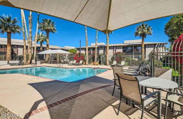Luxury and Resort like Living at Scottsdale Park Place!!!  Tile throughout, light, bright and Private patio not looking at your neighbors over Greenbelt area!!!  Pool!!!  BBQ areas and a Fitness Center!!!  Time to call this HOME!!!