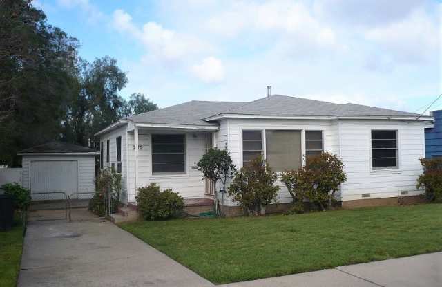 Single story house with large yard