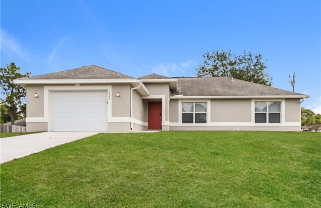 1049 Barcelona Street E - 1049 Barcelona Street East, Lehigh Acres, FL 33974