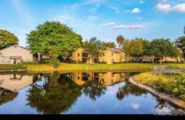 3833 Cocoplum Cir