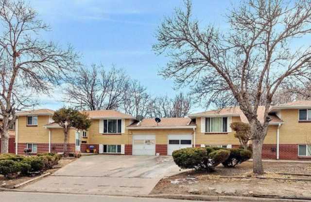 Spacious 2-Bedroom Garden-Level Apartment with Garage & In-Unit Laundry