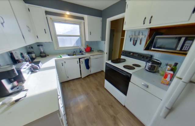 Photo of Fenced-in Backyard + Washer  Dryer Included + Off-Street Parking! Available August 1st!