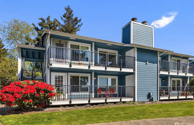 2 Bed 2 Bath Top-Floor Woodridge Condo with Sunset Views & 2-Car Garage