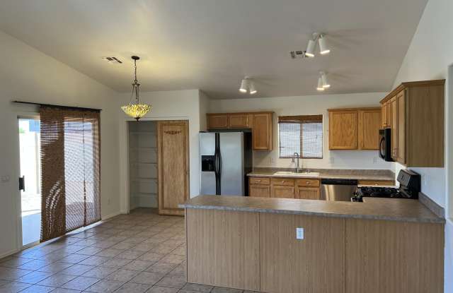 12509 W VALENTINE Avenue