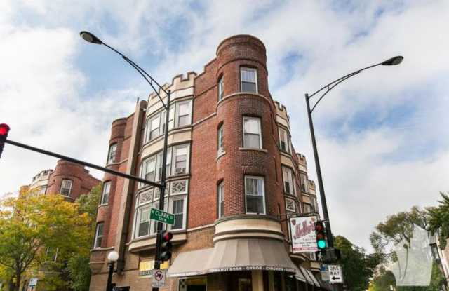 330 West Dickens Ave.,