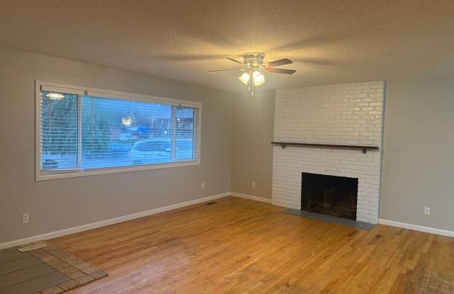 Charming 3 Bedroom with a Living Room, Sun Room,Huge Fenced Yard  More!