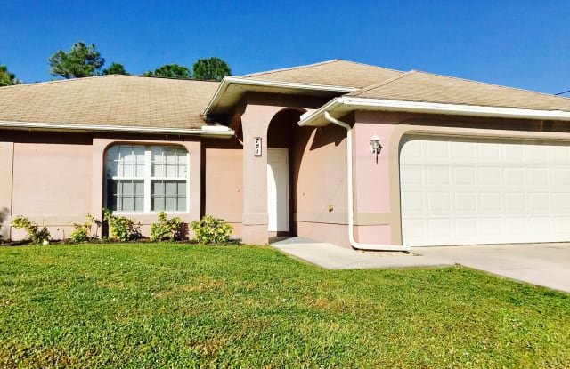 721 Long Distance Ln - 721 Long, Lehigh Acres, FL 33974