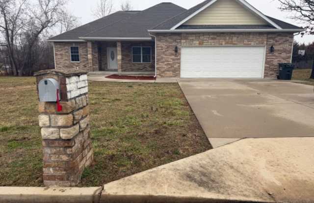 3 Bedroom 2 full bath home with oversized 2 car garage new vinyl flooring and community pool access