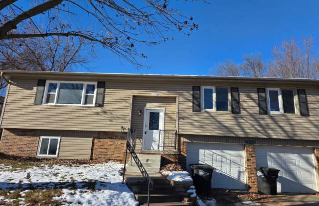 Photo of 4 bed 2.5 bath with a 2 car garage and fenced backyard