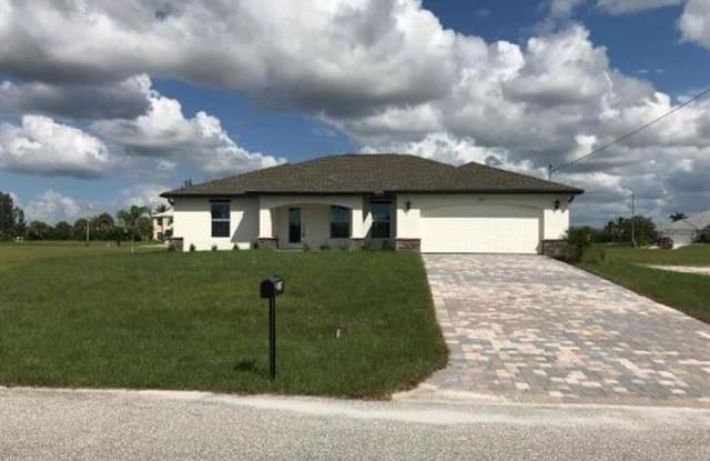 2209 NW 37th PL - 2209 Northwest 37th Place, Cape Coral, FL 33993