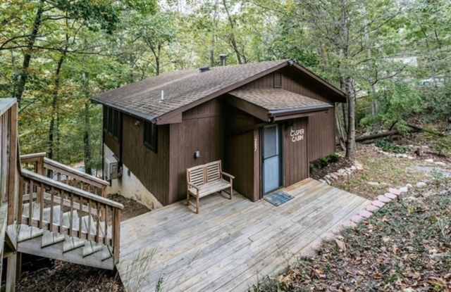 Warm and Welcoming Two-Bedroom Home with Bonus Office Space, and an Open Concept Design. Situated on a Wooded Lot!