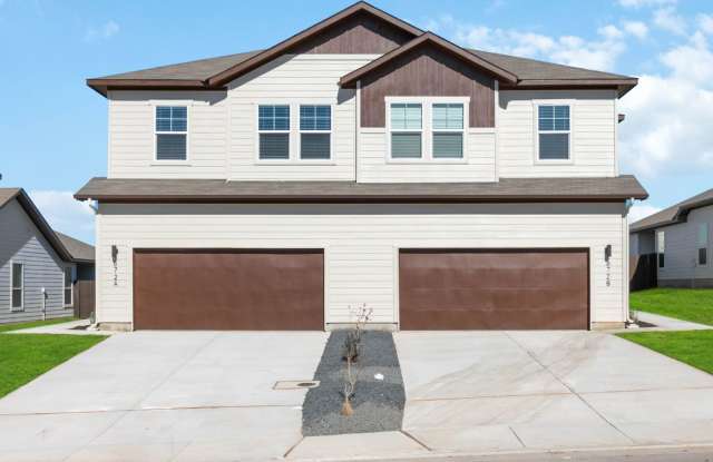 Photo of Brand New 4-Bedroom Home with Open Living  Private Yard in Buda