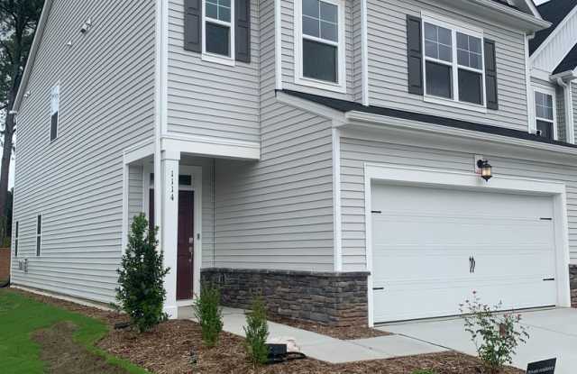 BRAND NEW TOWNHOME! 2 CAR GARAGE. SCREENED IN PORCH. MODERN KITCHEN. OPEN CONCEPT LIVING. BONUS ROOM