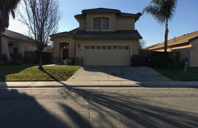 Charming home in established neighborhood with 4 bedrooms and 3 baths.