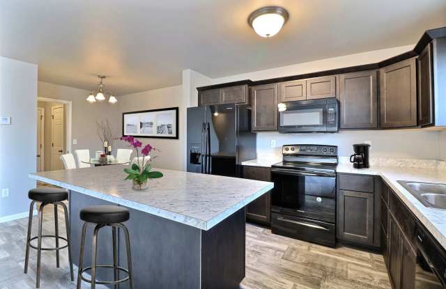 Looking for a modern twin home in a great North Bismarck location?