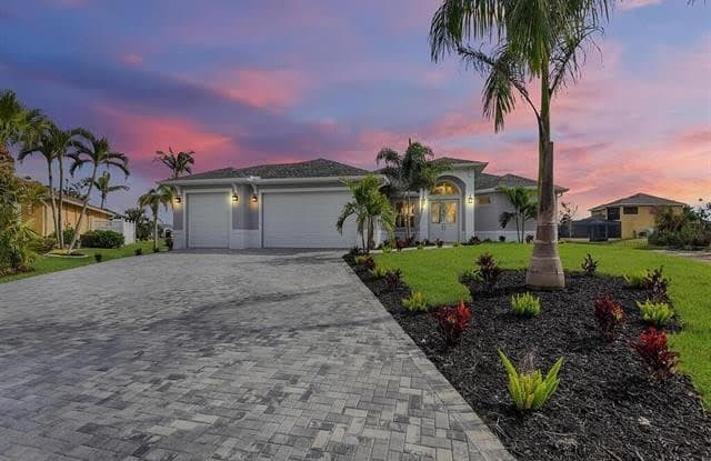 1857 NW 36th PL - 1857 Northwest 36th Place, Cape Coral, FL 33993