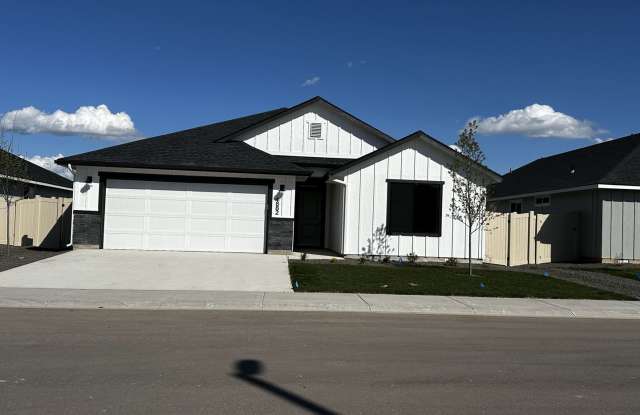 4 bedroom, 2 bathroom, 2 car garage.